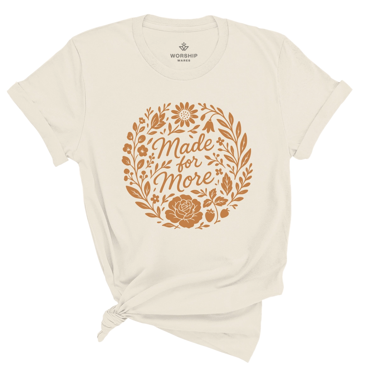 Christian t-shirt with “Made for More” in handwritten script surrounded by flowers and plants; soft cotton unisex tee symbolizing faith, growth, and divine purpose.
