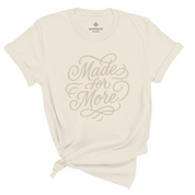 Christian t-shirt with the phrase “Made for More” in elegant hand-flourished script; unisex soft cotton shirt symbolizing purpose, faith, and calling.