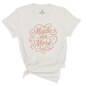 Christian t-shirt with the phrase “Made for More” in elegant hand-flourished script; unisex soft cotton shirt symbolizing purpose, faith, and calling.