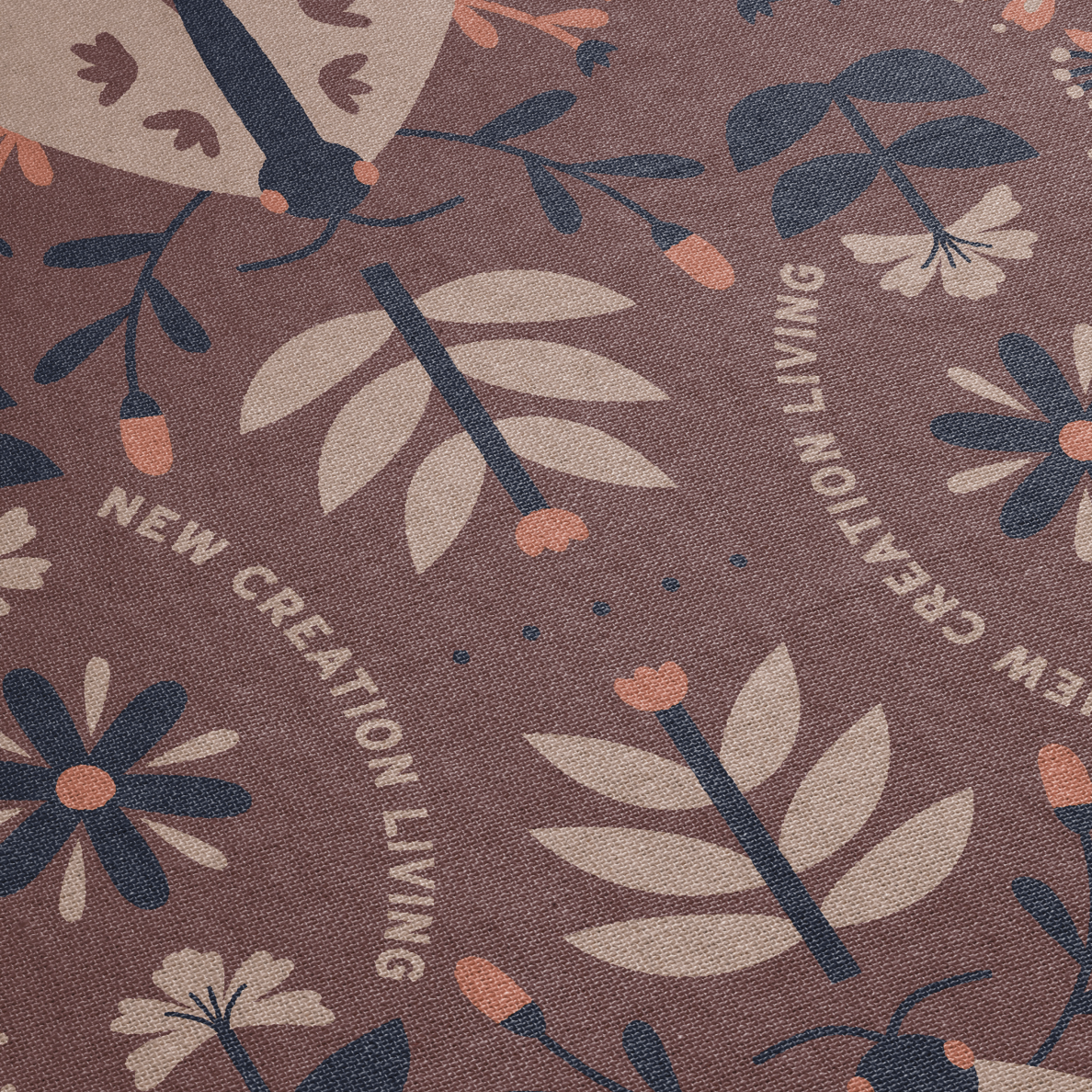 Floral pattern with 'New Creation Living' text on a brown background