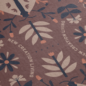 Floral pattern with 'New Creation Living' text on a brown background