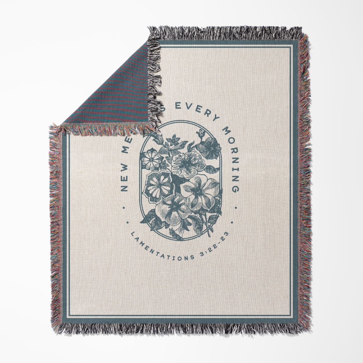 Blanket with floral design and text on a white background