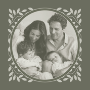 Family photo with two children framed by decorative leaves on a solid background