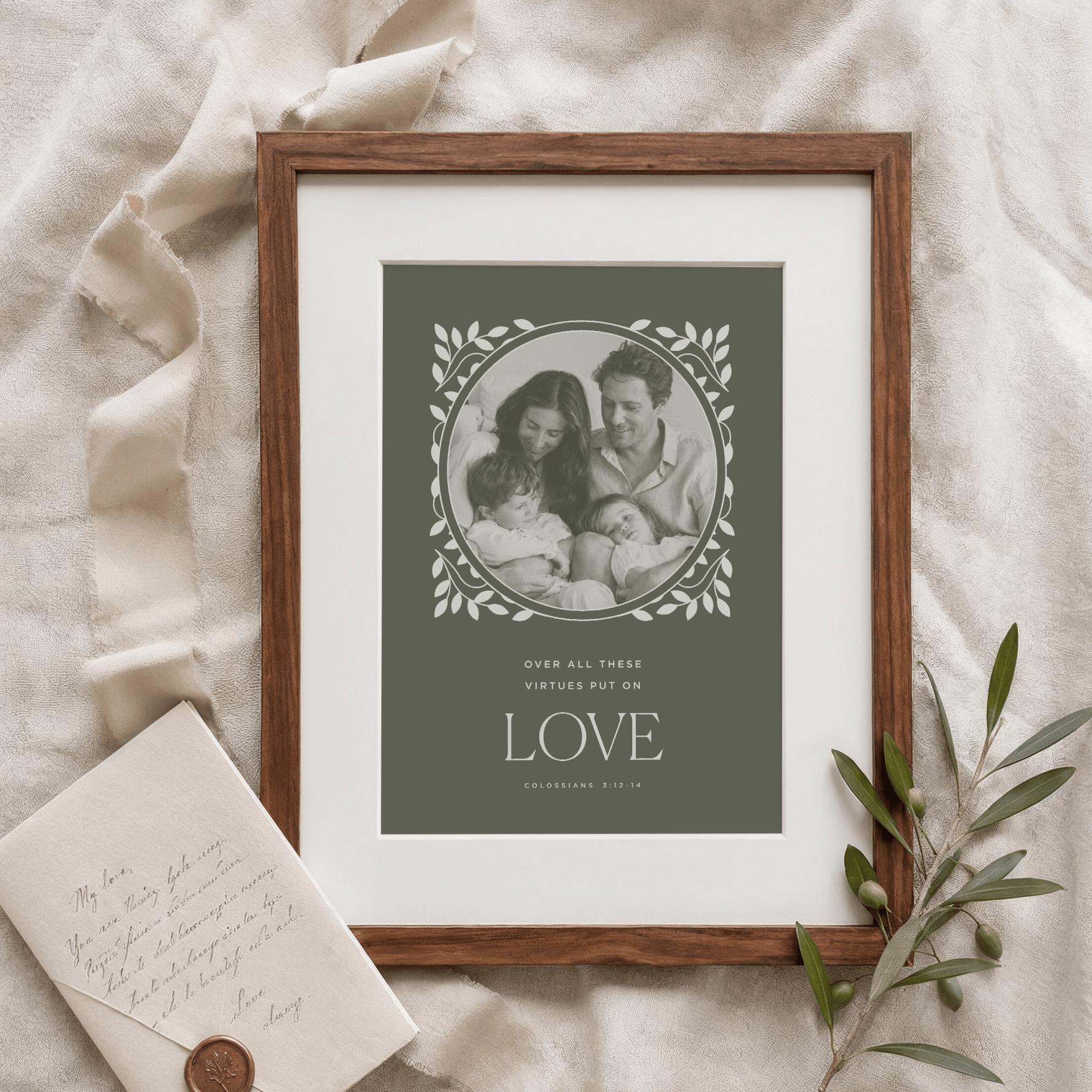 Framed family photo with decorative text on a textured surface