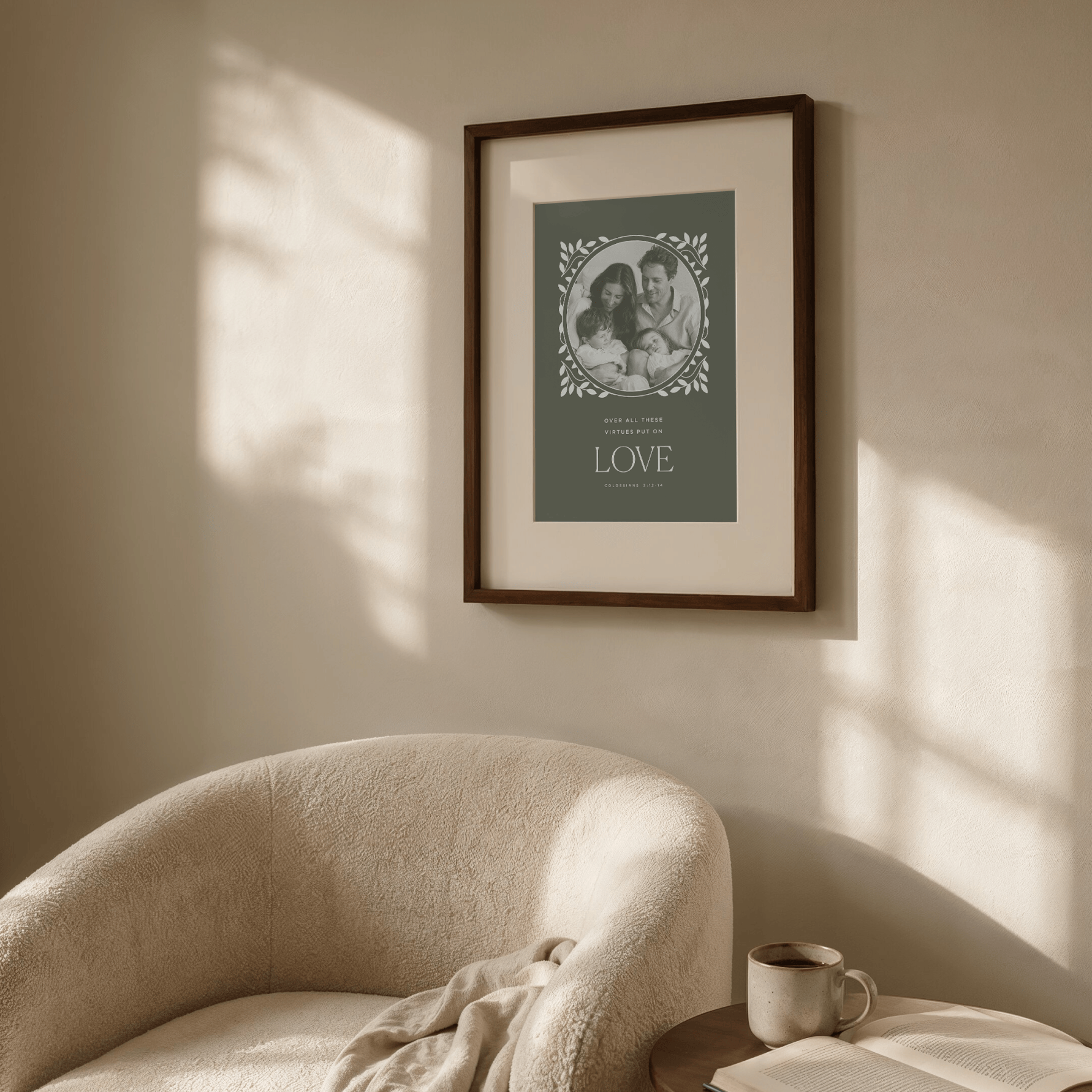 Framed family photo with 'LOVE' text on a wall with sunlight casting shadows.