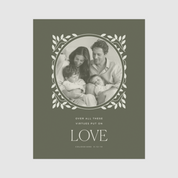 Family photo in an oval frame with decorative leaves on a green background with text.
