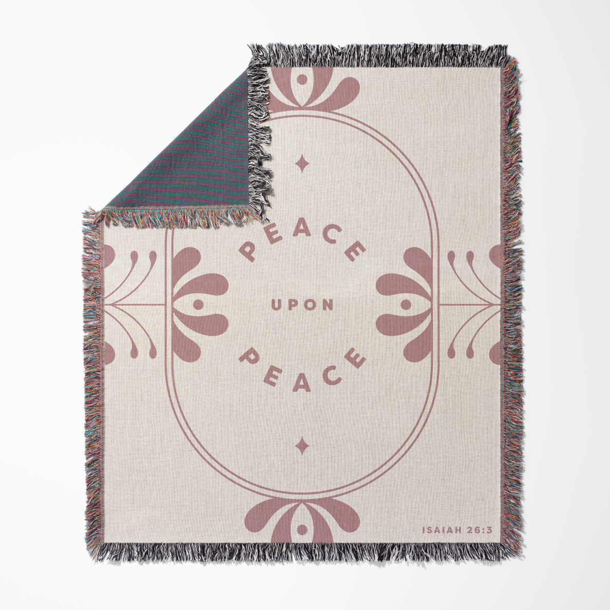 Blanket with 'Peace Upon Peace' text and decorative design on a white background
