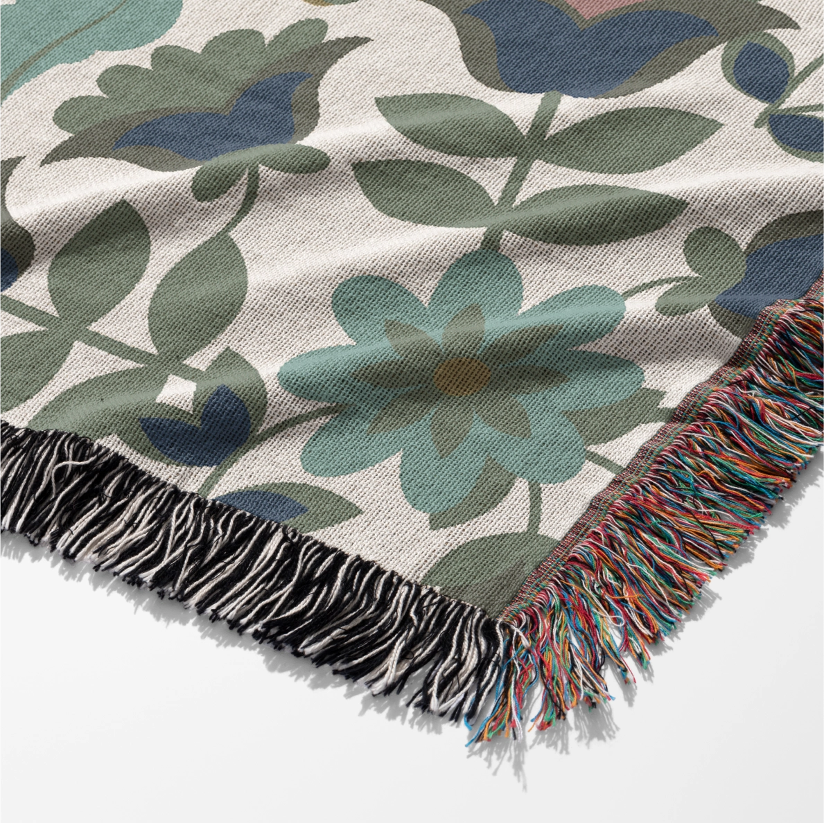 Christian throw blanket with garden-inspired folk art design and the phrase 'Praise God from whom all blessings flow' in soft cottage colors