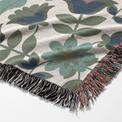 Christian throw blanket with garden-inspired folk art design and the phrase 'Praise God from whom all blessings flow' in soft cottage colors