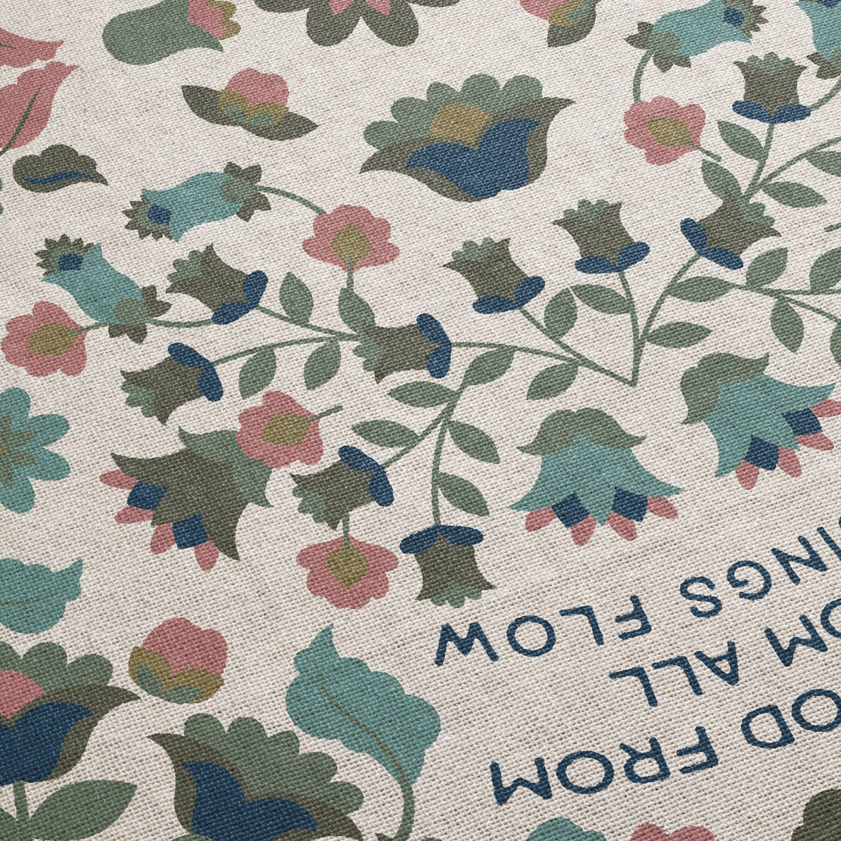 Christian throw blanket with garden-inspired folk art design and the phrase 'Praise God from whom all blessings flow' in soft cottage colors