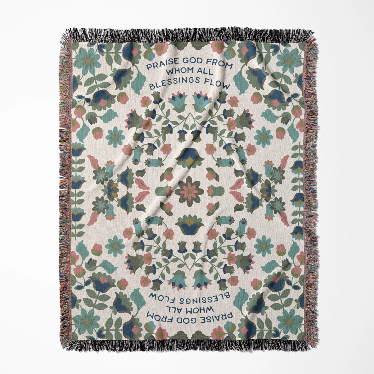 Christian throw blanket with garden-inspired folk art design and the phrase 'Praise God from whom all blessings flow' in soft cottage colors