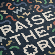 Text pattern with 'Raise the Roof' on a dark background with colorful shapes