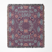 Floral patterned blanket with 'praise the LORD' text on a white background