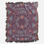 Floral patterned blanket with 'praise the LORD' text on a white background