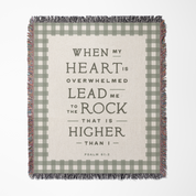 Blanket with text 'When my heart is overwhelmed, lead me to the rock that is higher than I. Psalm 61:2' on a checkered background.