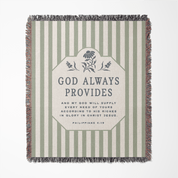 Striped blanket with text and floral design on a white background