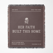 Blanket with text 'Her Faith Built This Home' and floral design on a gray background