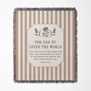 Striped blanket with text and floral design on a white background