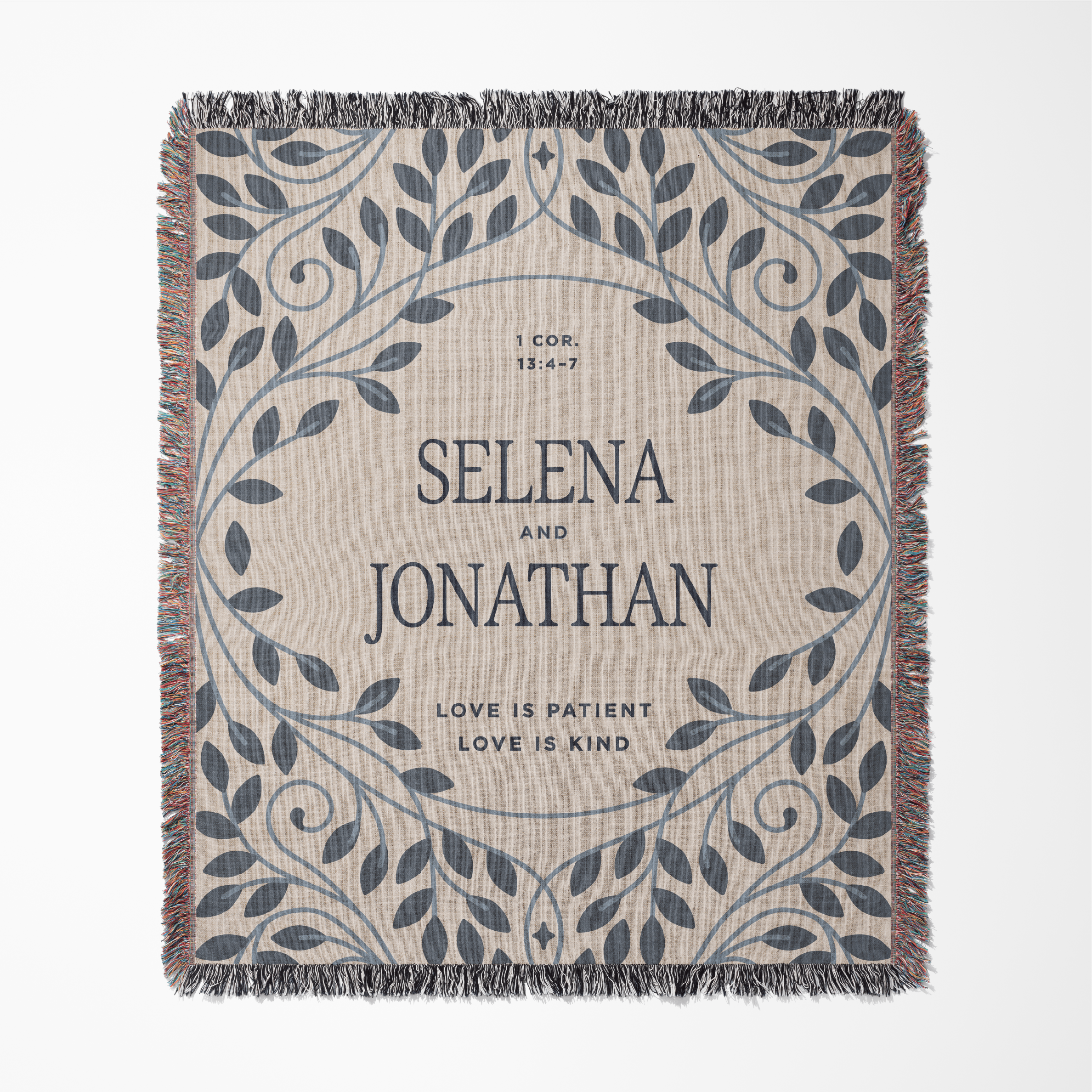 Personalized throw blanket with decorative border and text on a beige background