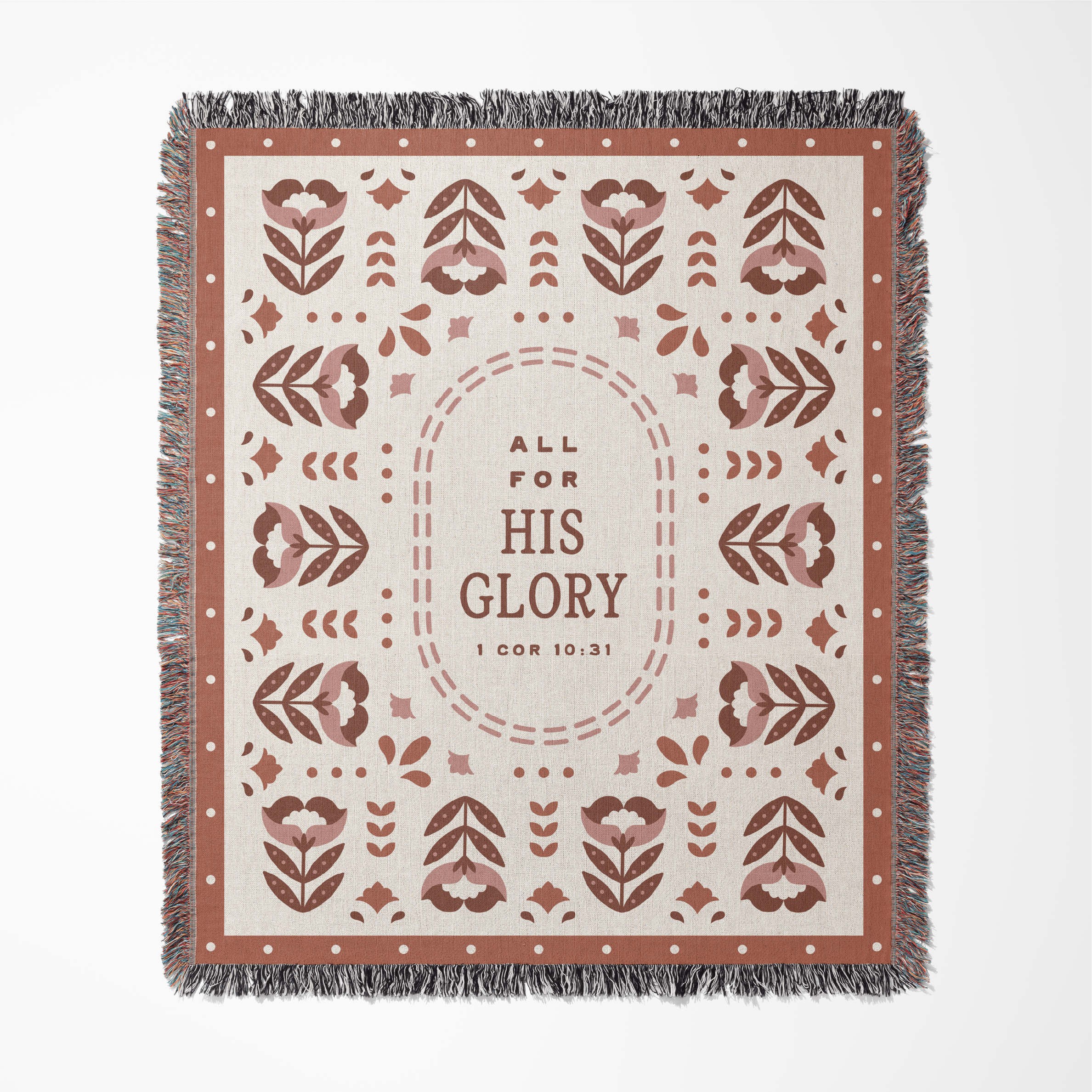 Decorative blanket with floral pattern and 'All for His Glory' text on a white background