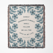 Floral patterned blanket with text on a white background