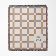 Checkered blanket with 'Jesus is the Way' text on a white background
