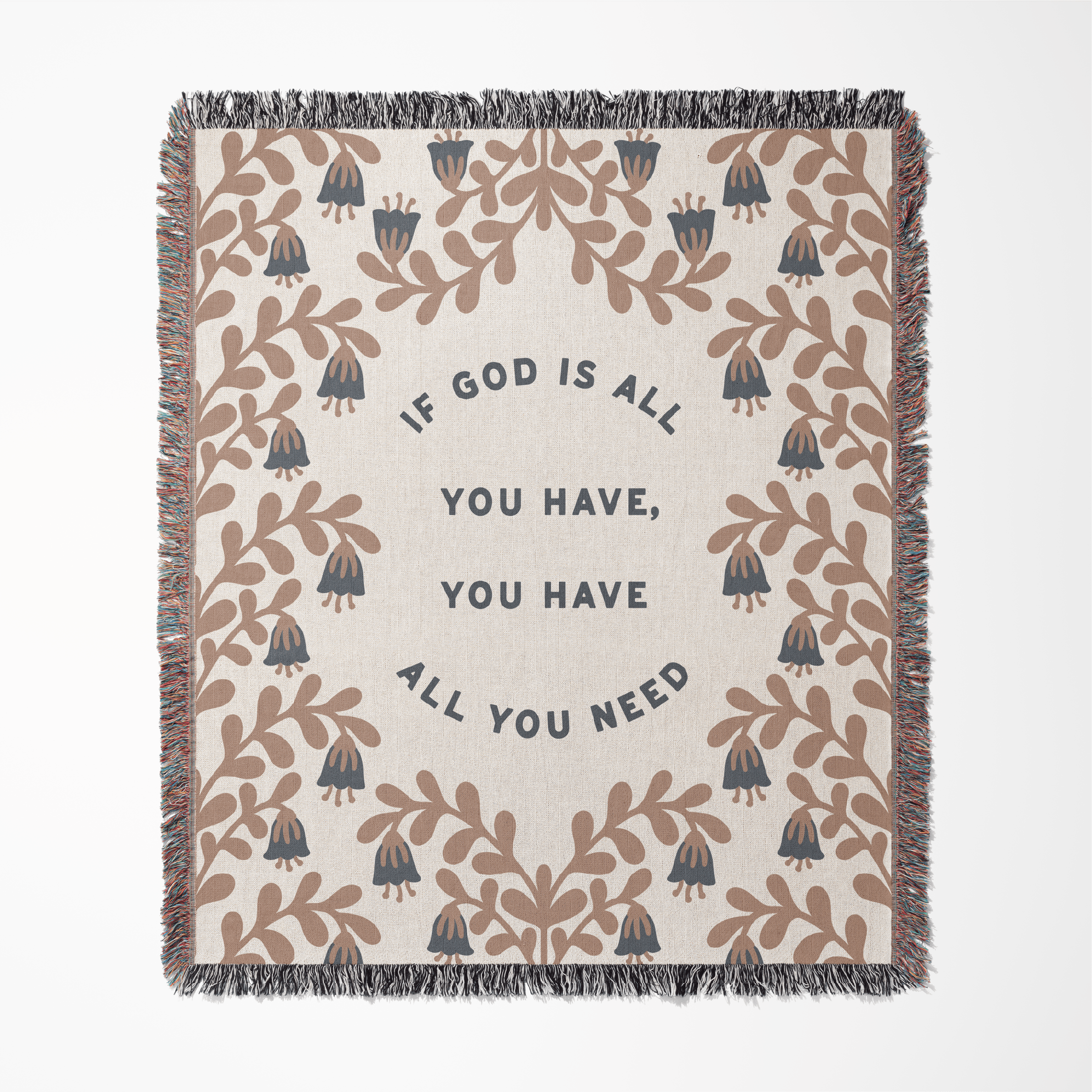 Blanket with decorative pattern and motivational quote on a white background