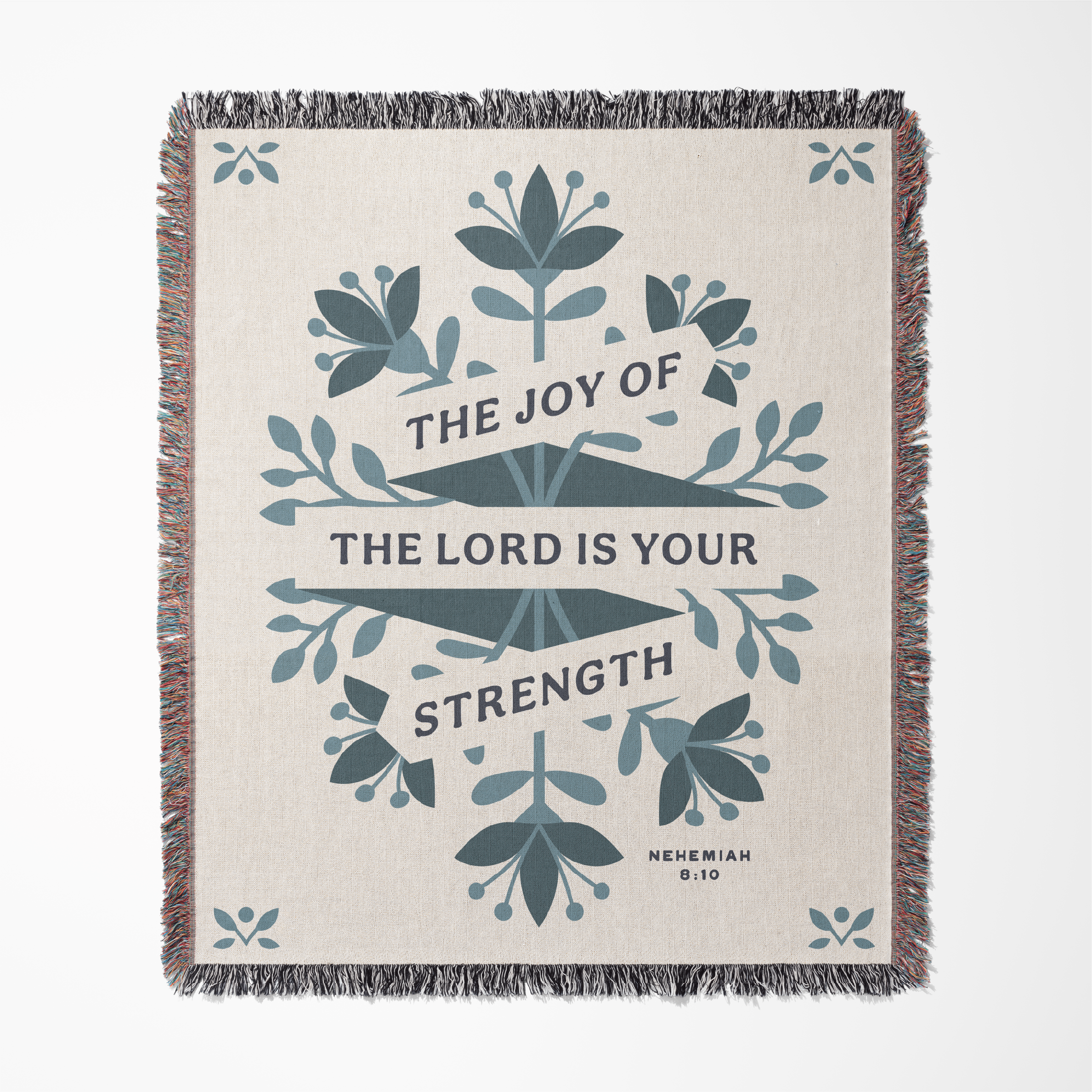 Blanket with floral design and text 'The Joy of the Lord is Your Strength' on a white background