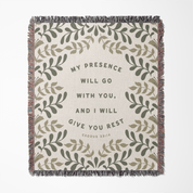 Blanket with leaf pattern and motivational quote on a white background