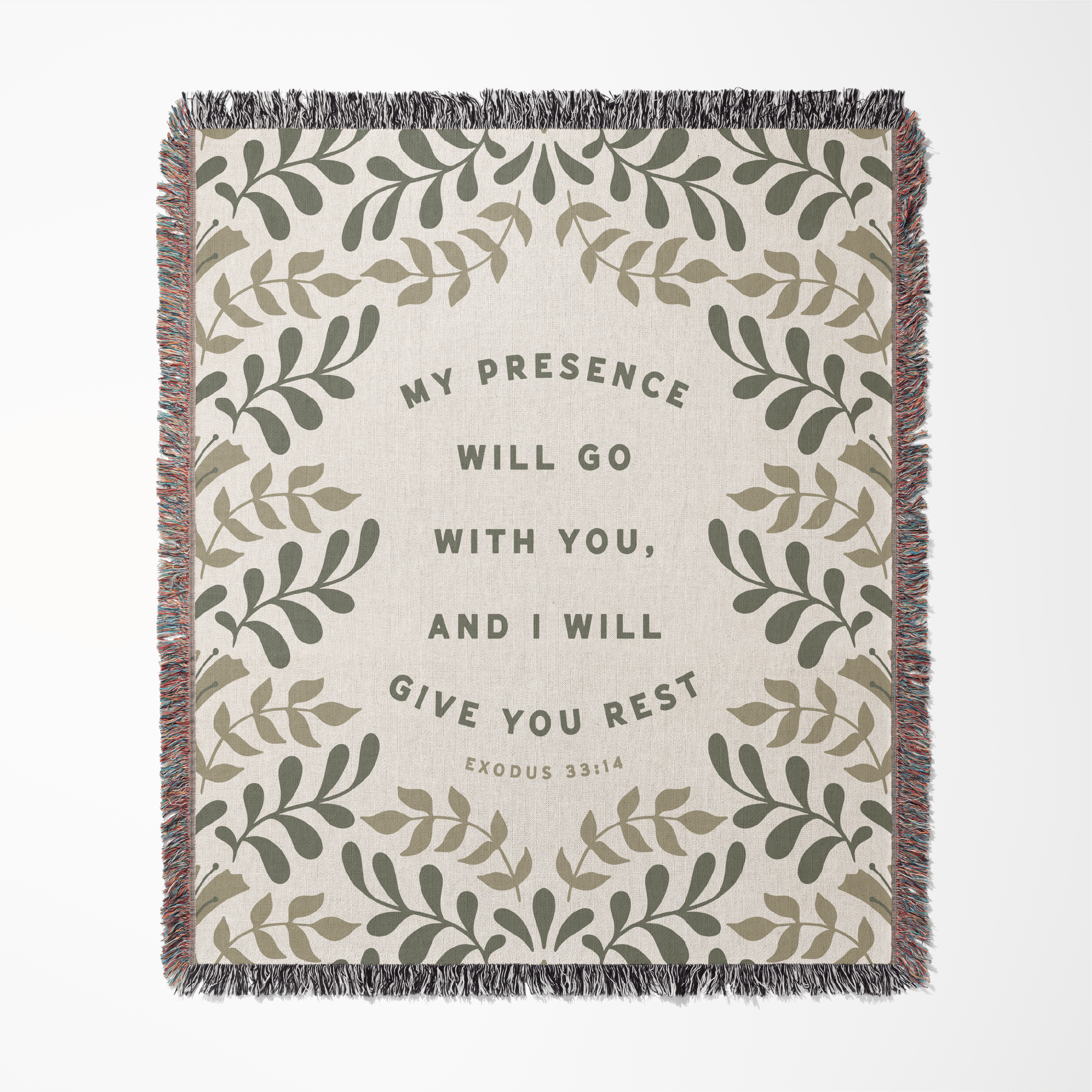 Blanket with leaf pattern and motivational quote on a white background