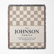 Checkered blanket with 'The Johnson Family' text on a white background