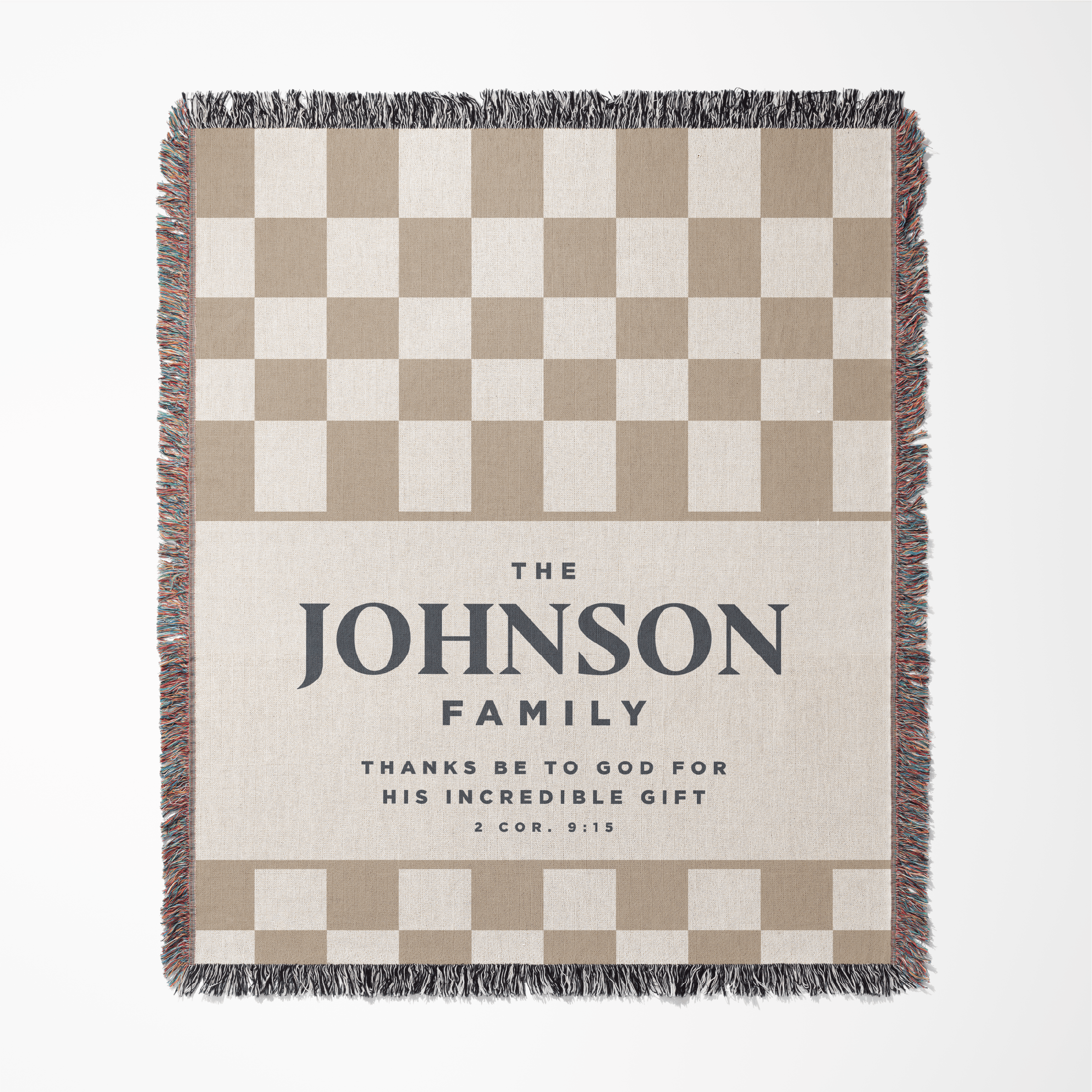 Checkered blanket with 'The Johnson Family' text on a white background