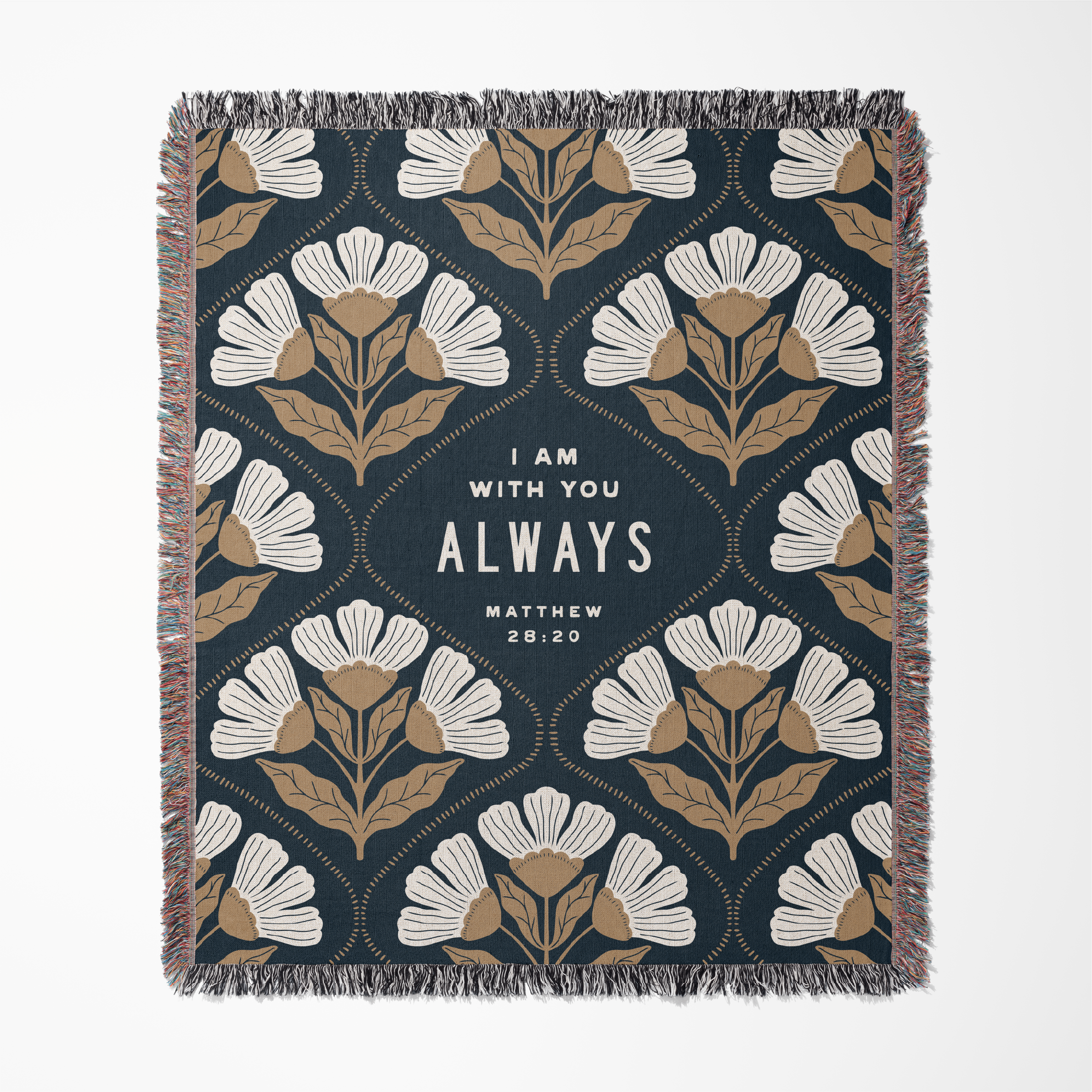 Floral patterned blanket with text 'I am with you always' on a white background