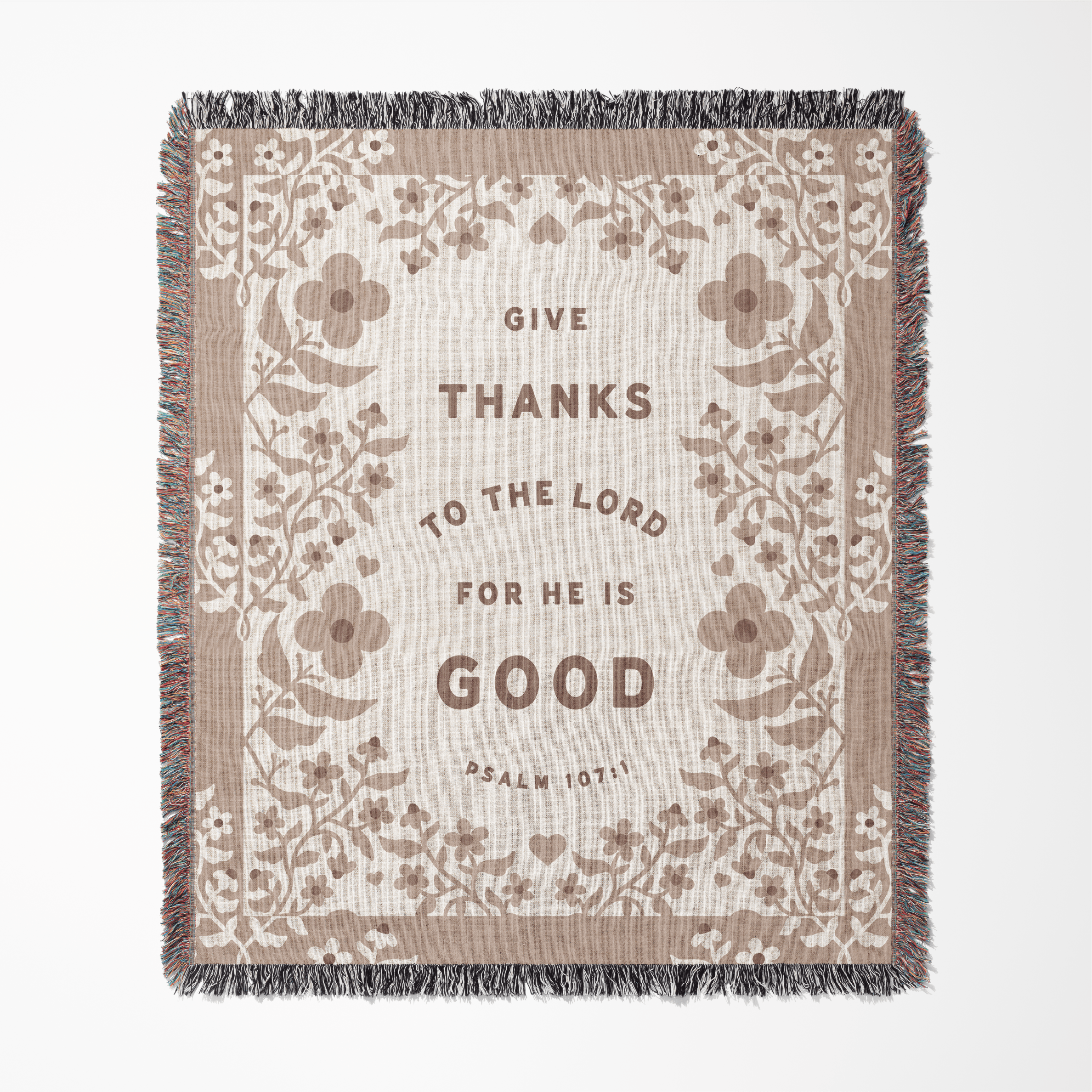 Blanket with floral patterns and text on a white background