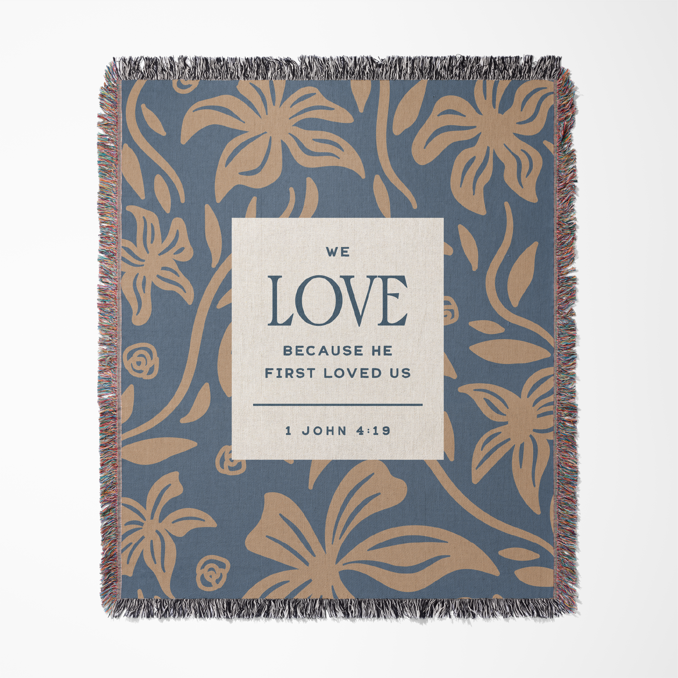 Floral patterned blanket with a text overlay on a white background