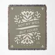 Green blanket with white floral design and text 'Not my will but yours' on a white background