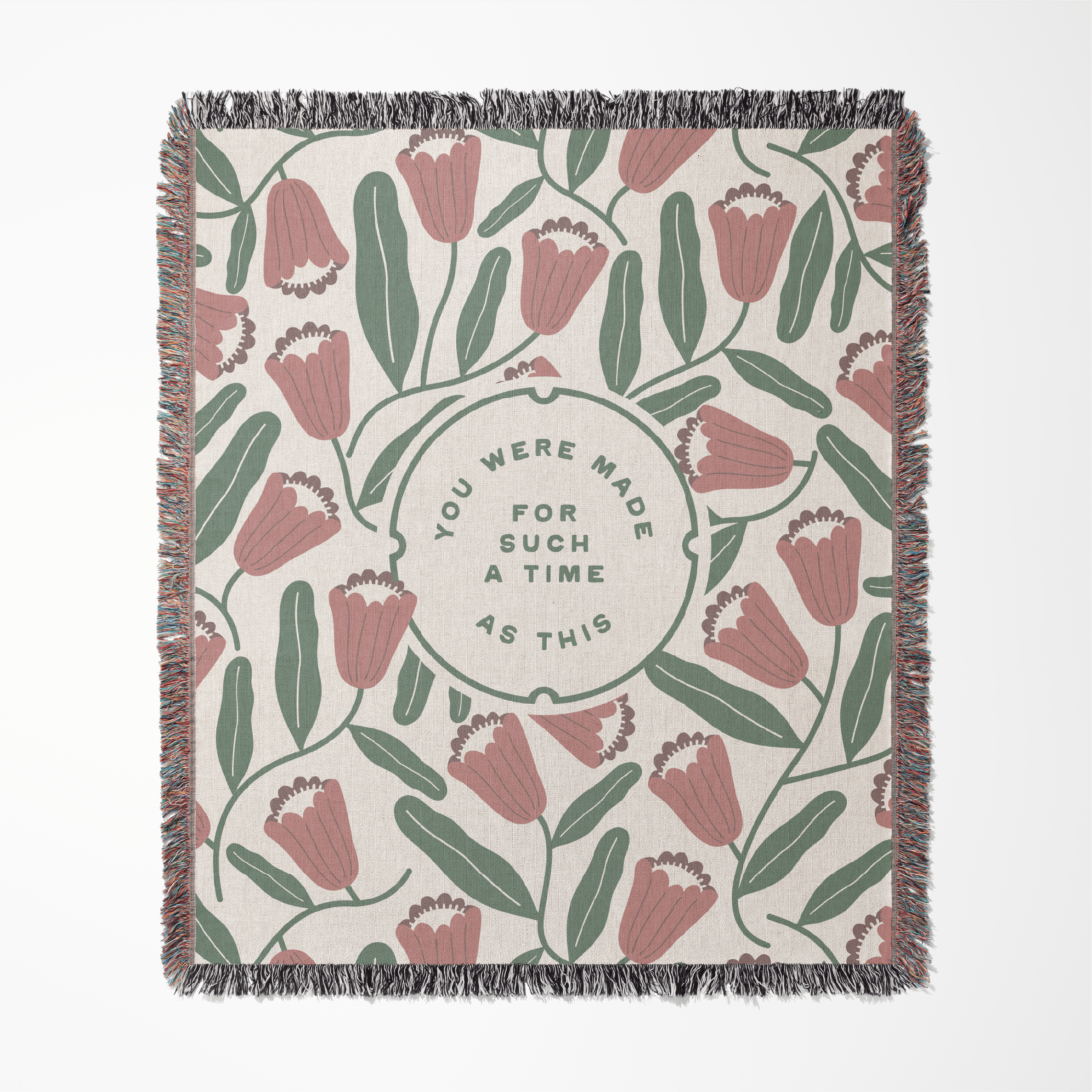 Floral patterned blanket with text on a white background