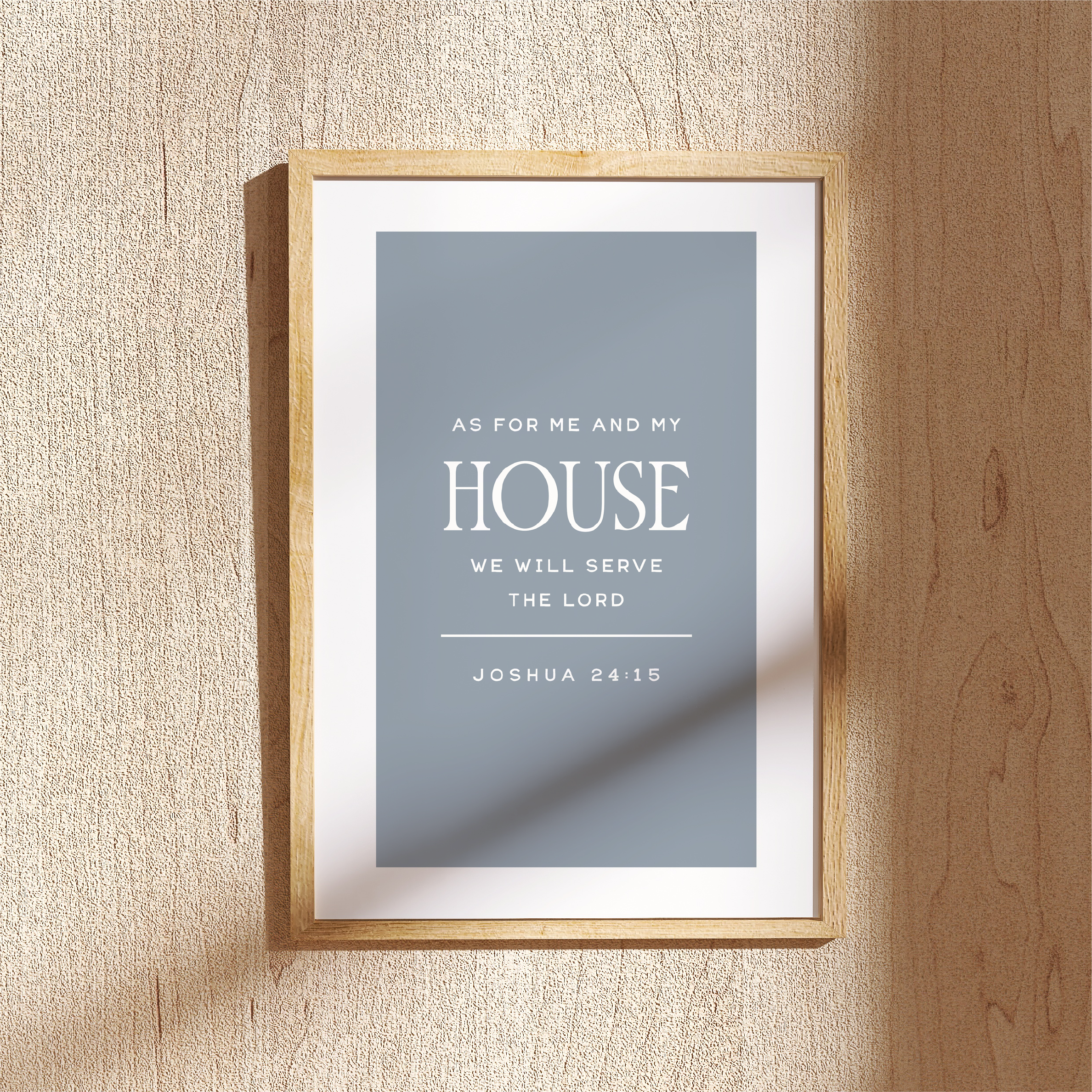 Framed print with inspirational quote on a textured wall