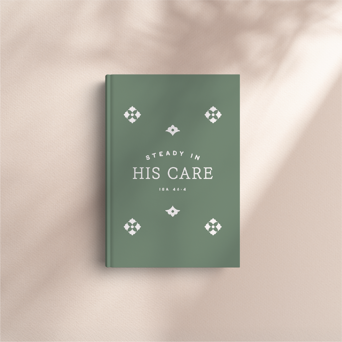 Green book titled 'Steady in His Care' with decorative elements on a beige background