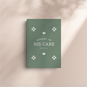 Green book titled 'Steady in His Care' with decorative elements on a beige background