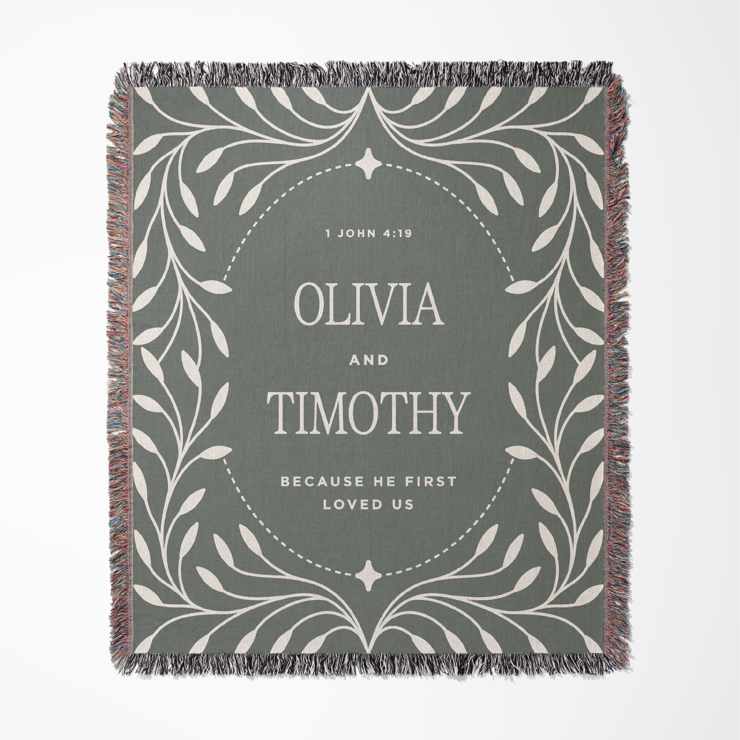 Blanket with decorative text and design on a gray background