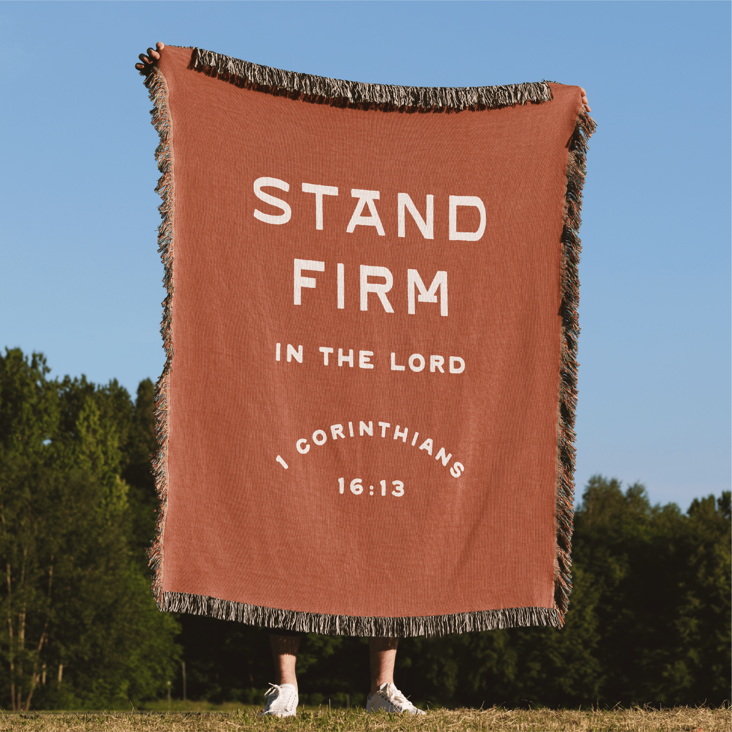 Stand Firm in the Lord blanket held outside