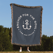Anchor for the soul firm and secure woven blanket held in park