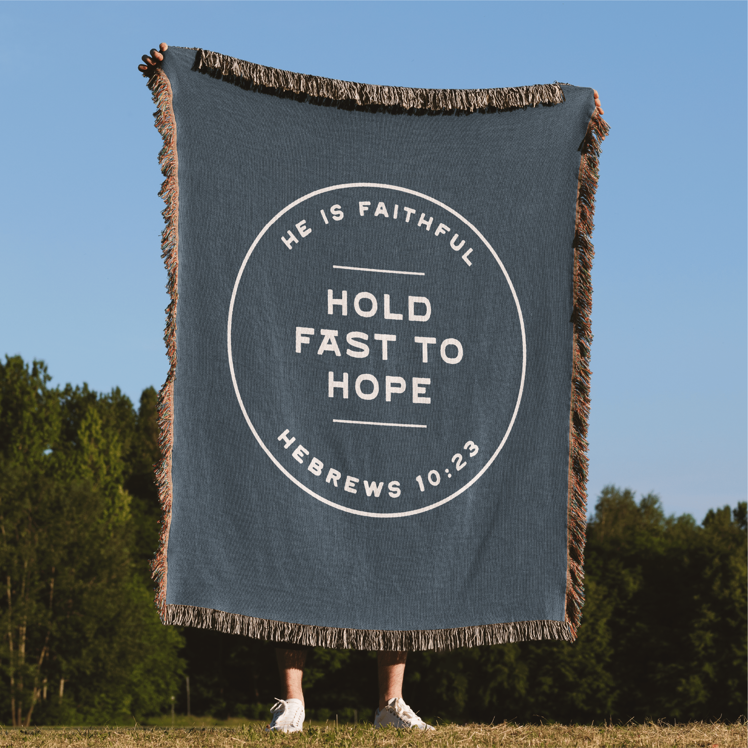 Hold fast to hope - He is Faithful Woven Blanket held in park