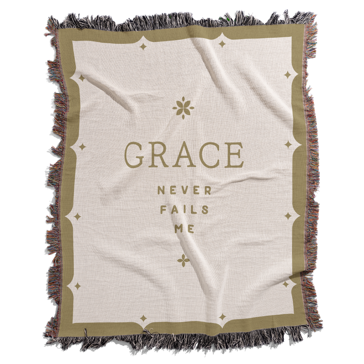 Blanket with 'GRACE NEVER FAILS ME' text on a white background