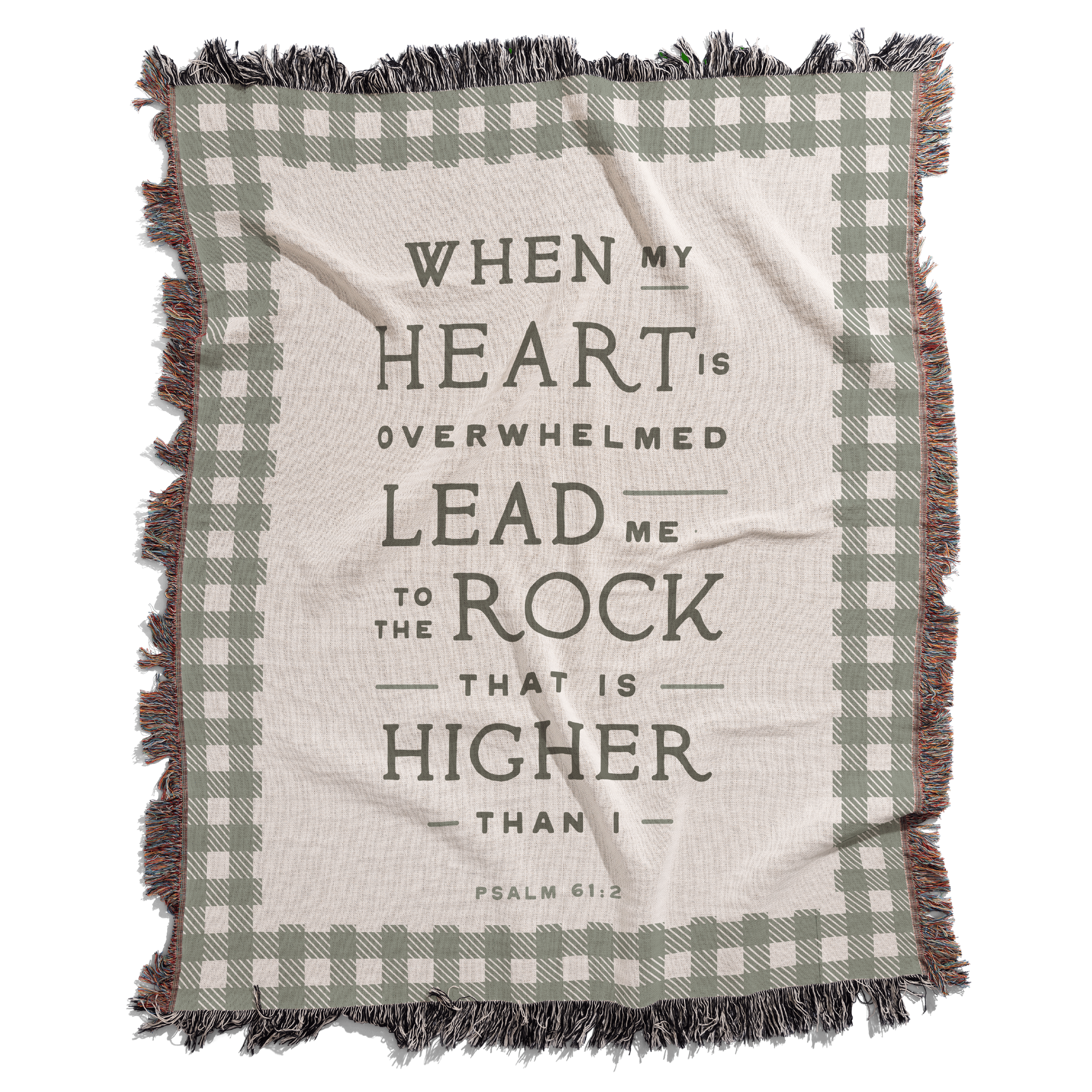 Blanket with plaid pattern and motivational quote on a white background