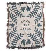 Blanket with leaf pattern and 'Love Like Jesus' text on a white background