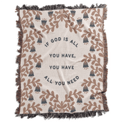 Blanket with floral pattern and motivational quote on a white background