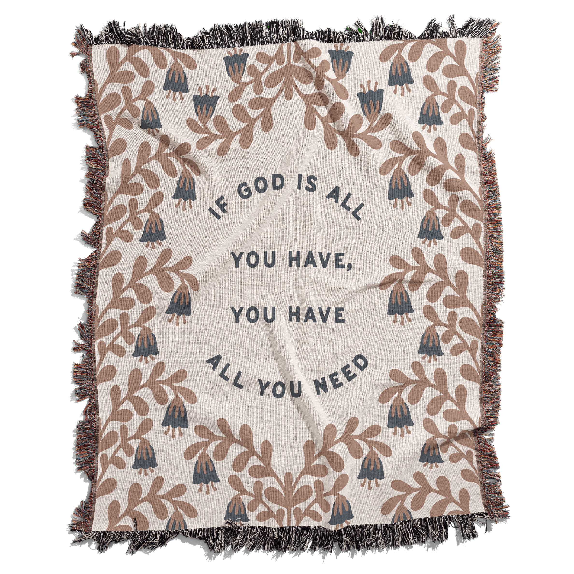 Blanket with floral pattern and motivational quote on a white background