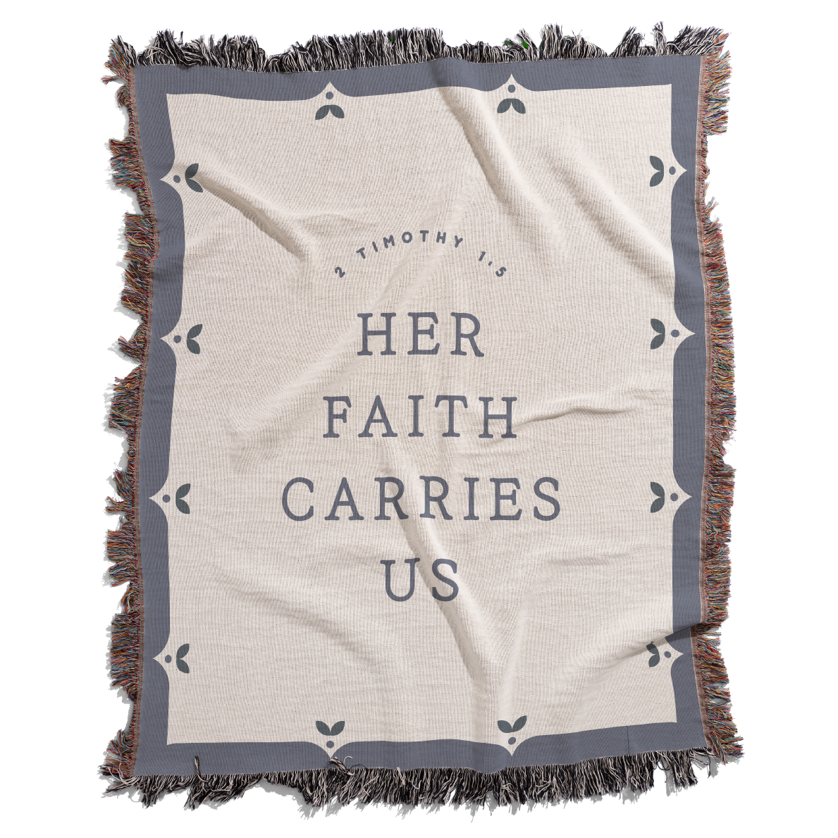 Blanket with 'Her Faith Carries Us' text and decorative border on a white background